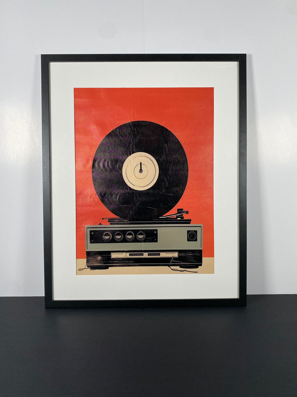 "Replay" Canvas Art Piece in Modern Black Frame and White Matte.