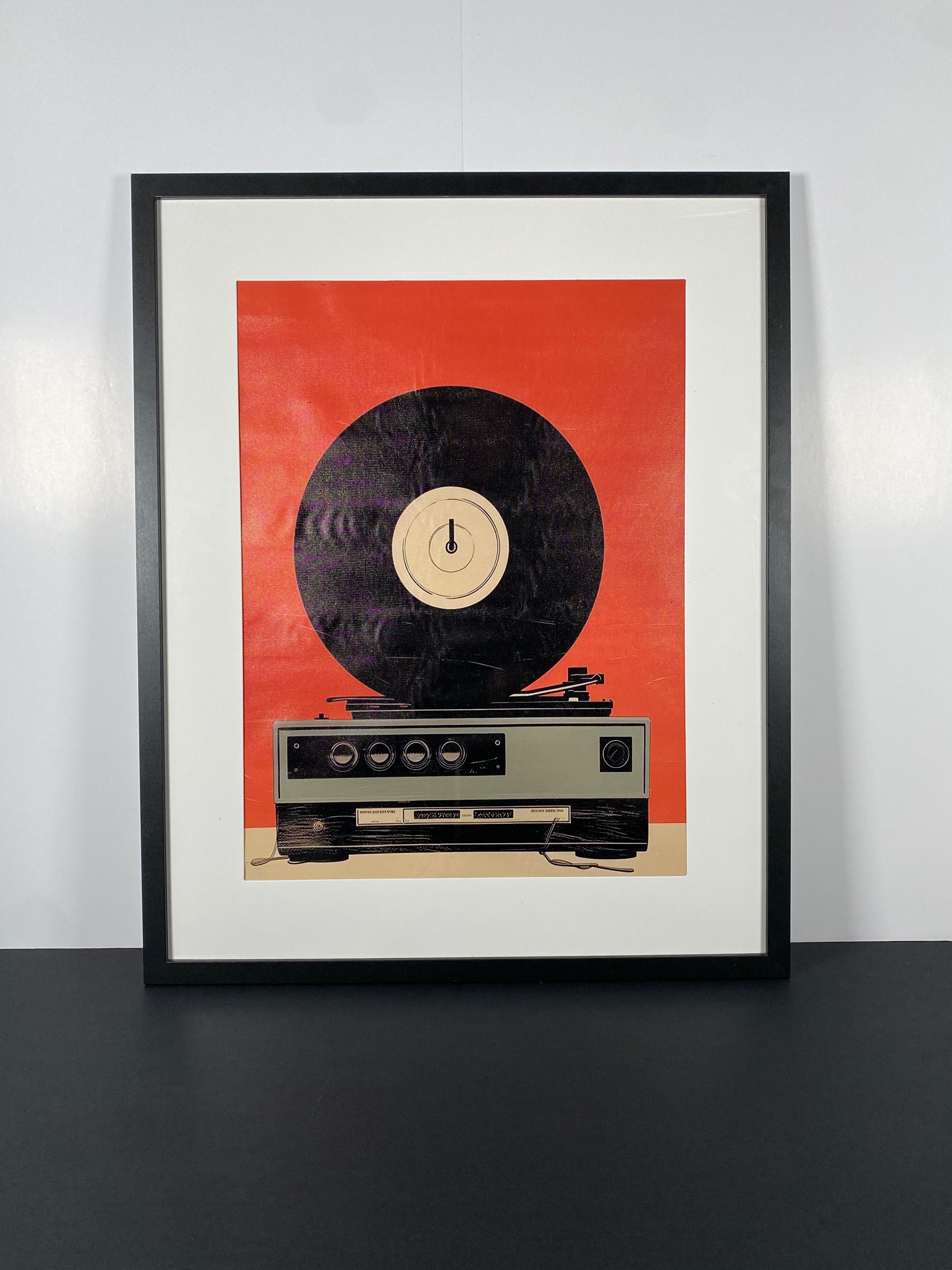"Replay" Canvas Art Piece in Modern Black Frame and White Matte.