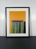 "Matchbox Dreams" Canvas Art Piece in Modern Black Frame and White Matte.