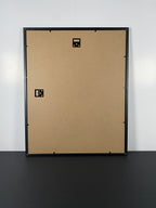 "Matchbox Dreams" Canvas Art Piece in Modern Black Frame and White Matte.