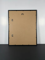 "Ready to Turn the Page" Canvas Art Print by Maarten Leon in Modern Black Frame