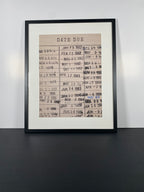 "Due Date" Canvas Art Piece in Modern Black Frame and White Matte.