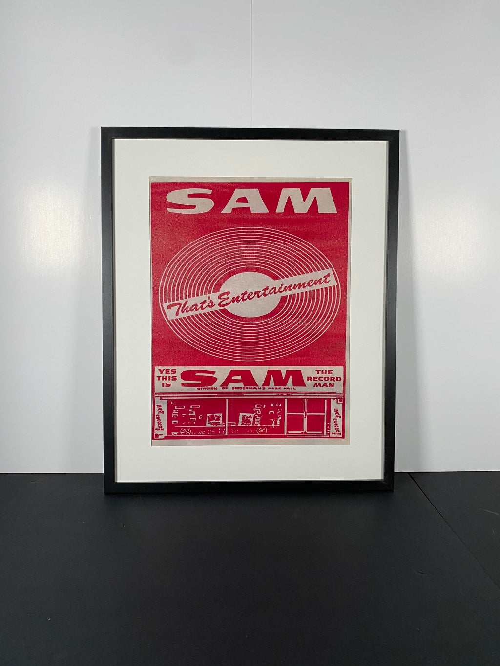 Sam the Record Man Canvas Art Piece in Modern Black Frame