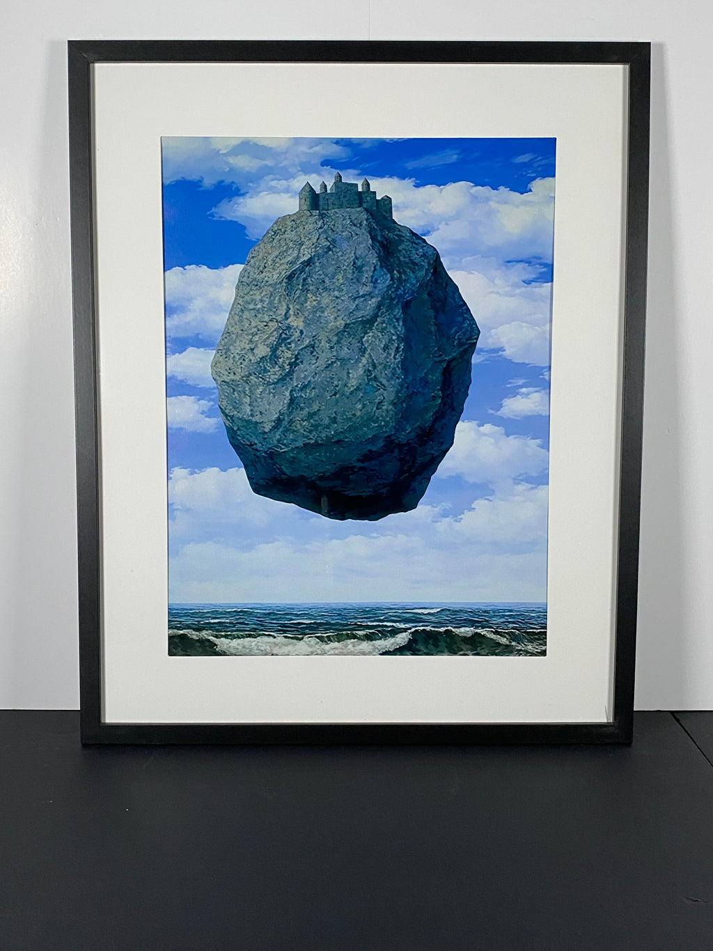 "The Castle of the Pyrenees" by Rene Magritte Canvas Art Print In Modern Black Frame