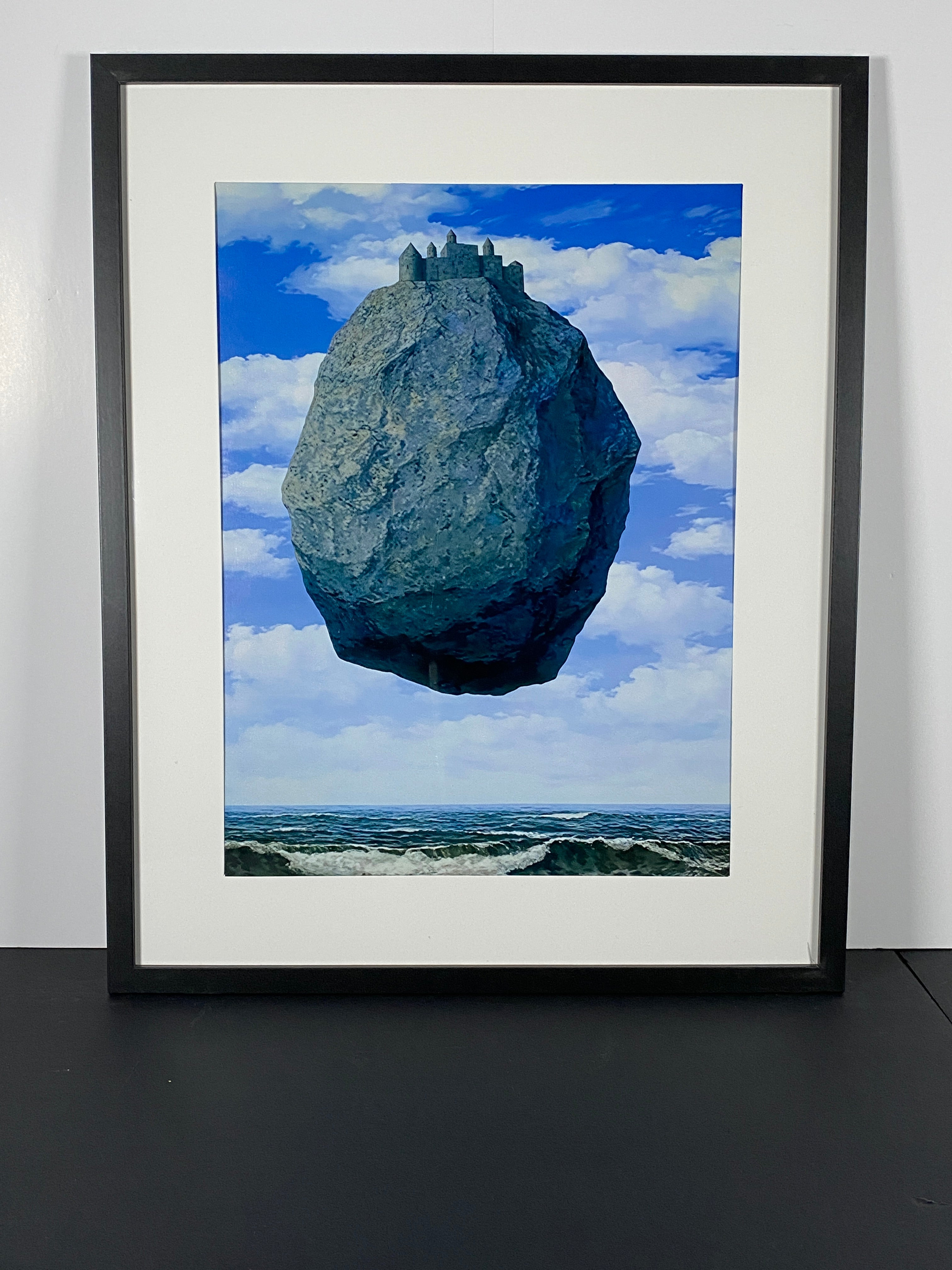 "The Castle of the Pyrenees" by Rene Magritte Canvas Art Print In Modern Black Frame