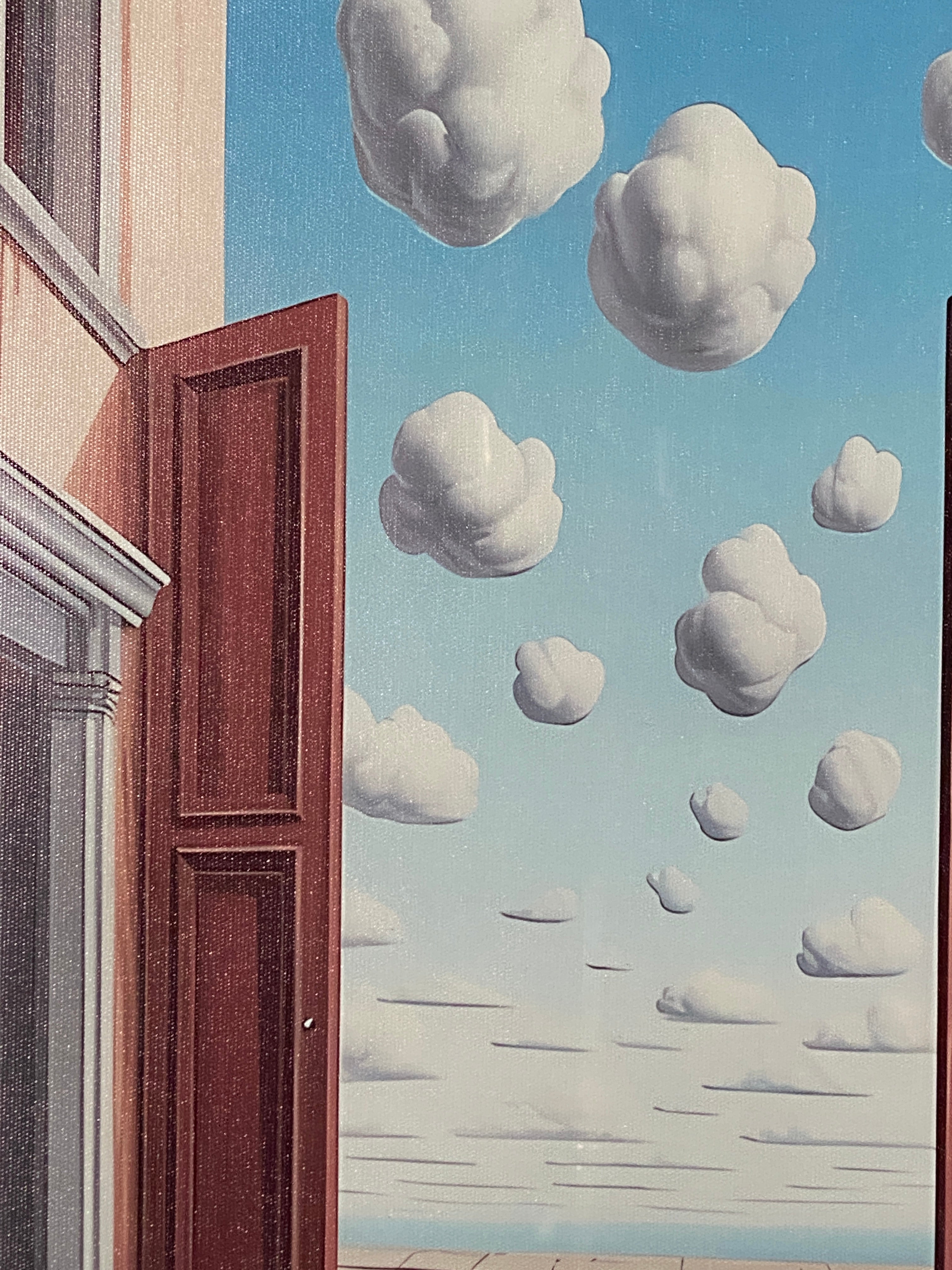 "L'embellie" (The Improvement) Canvas Art Print by Rene Magritte in Modern Black Frame.
