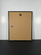 "L'embellie" (The Improvement) Canvas Art Print by Rene Magritte in Modern Black Frame.
