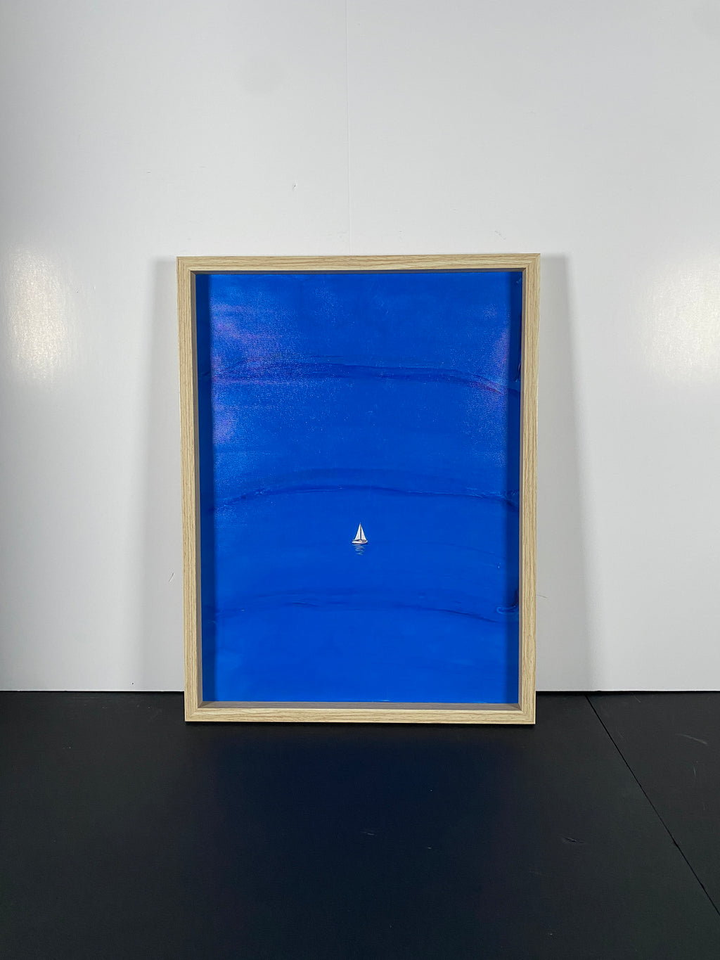 "Blue Calm" Canvas Art Piece in Light Wood Frame