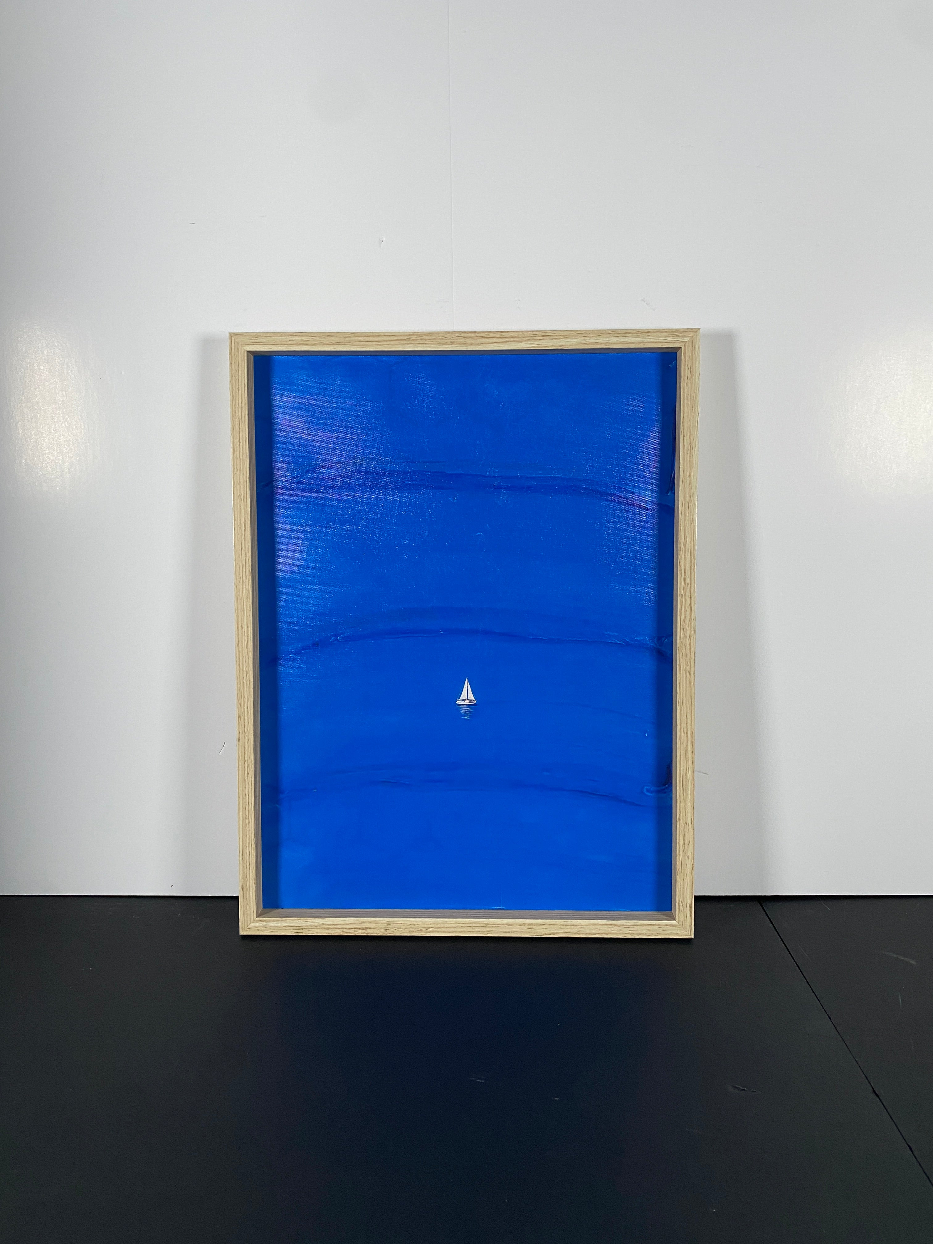 "Blue Calm" Canvas Art Piece in Light Wood Frame