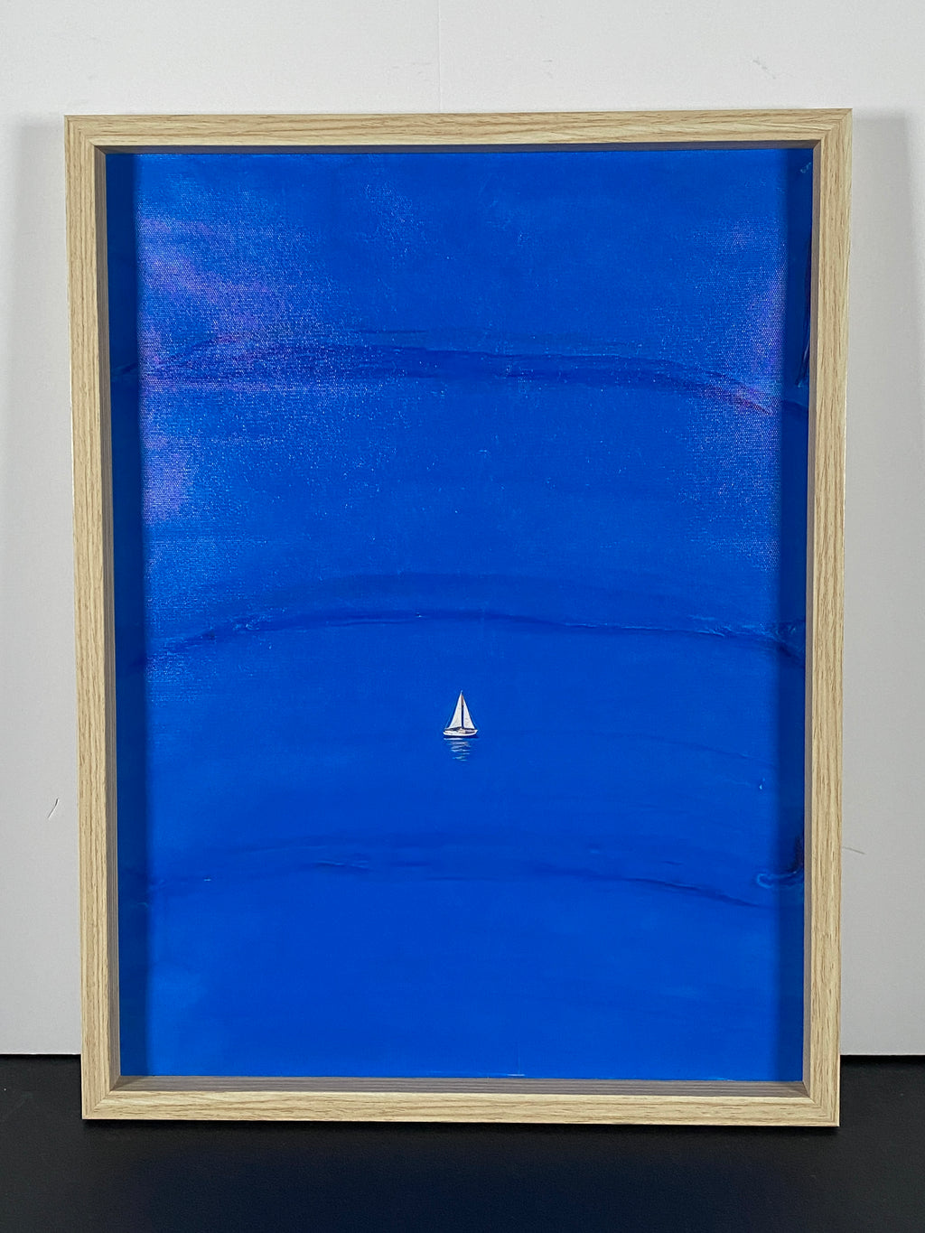 "Blue Calm" Canvas Art Piece in Light Wood Frame