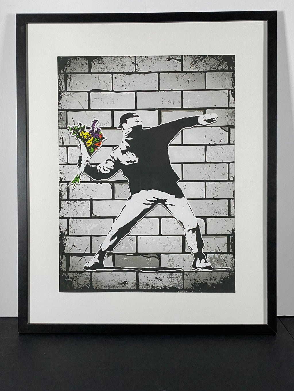 "Flower Bomber" - Bansky Canvas Art Piece in Modern Black Frame