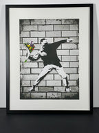 "Flower Bomber" - Bansky Canvas Art Piece in Modern Black Frame