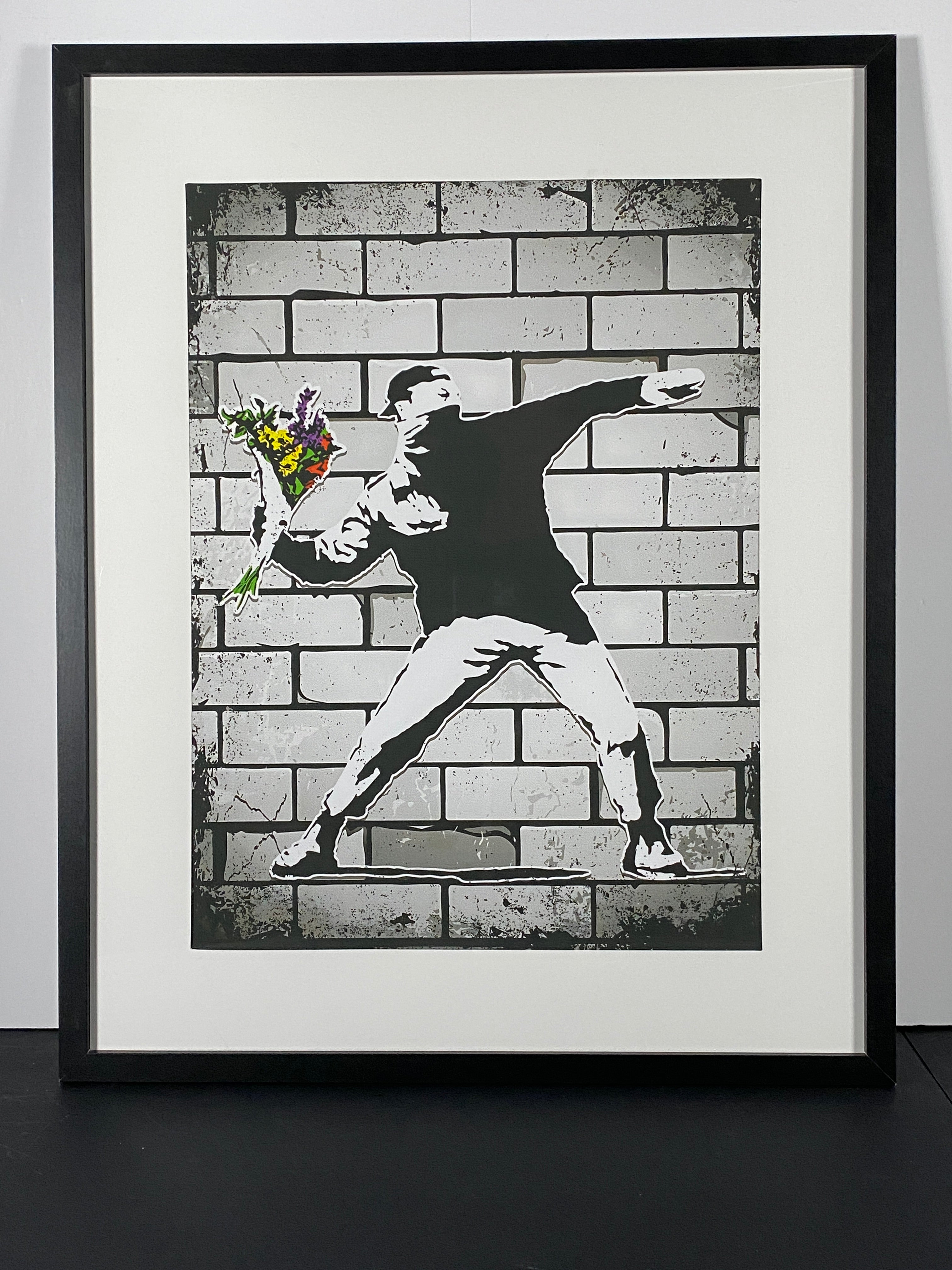 "Flower Bomber" - Bansky Canvas Art Piece in Modern Black Frame